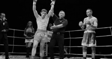 Darius Skliaudys getting his hand raised by the referee and getting declared as a winner in the fight