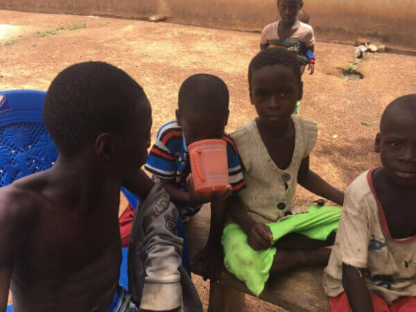 village kids drinking clean water